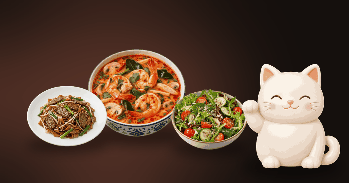 Illustration of a bowl of tom yum soup, a plate of stir-fried noodles and a green salad on a dark table, with a small white cat looking happy
